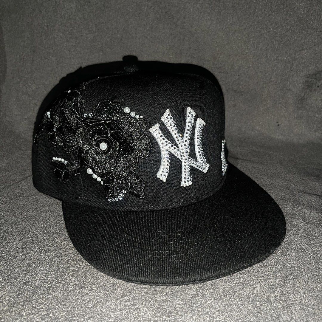 Customize Rhinestone Flower Cap NY (Category: Caps & Hats) located in Taguig. Submitted by bling.dpt (Listing ID 1468650030, Image 1). Description: Fitted structured brim sparkling rhinestones Detailing: Black floral lace applique on the side and back, accented with faux pearls and rhinestones Condition: Brand new, eye-catching custom design.