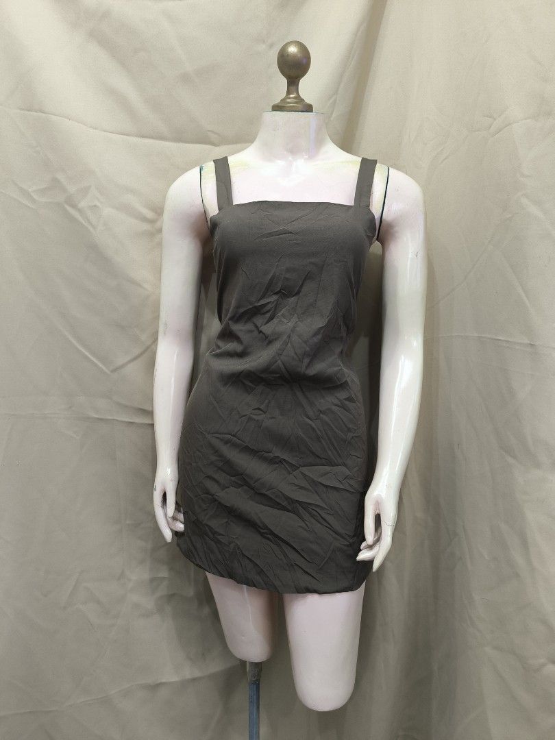 Dark Brown Square Neck Bodycon Mini Dress (Category: Dresses) located in Marikina City. Submitted by mrlfashion23 (Listing ID 1468594804, Image 1). Description: - Color: Dark brown - Style: Basic, bodycon mini dress - Features: Square neckline, thick straps, smooth fabric - Versatility: Easy to dress up with heels or down with sneakers - Condition: Good, just needs a quick iron due to storage wrinkles - Perfect for: Night outs or casual days.