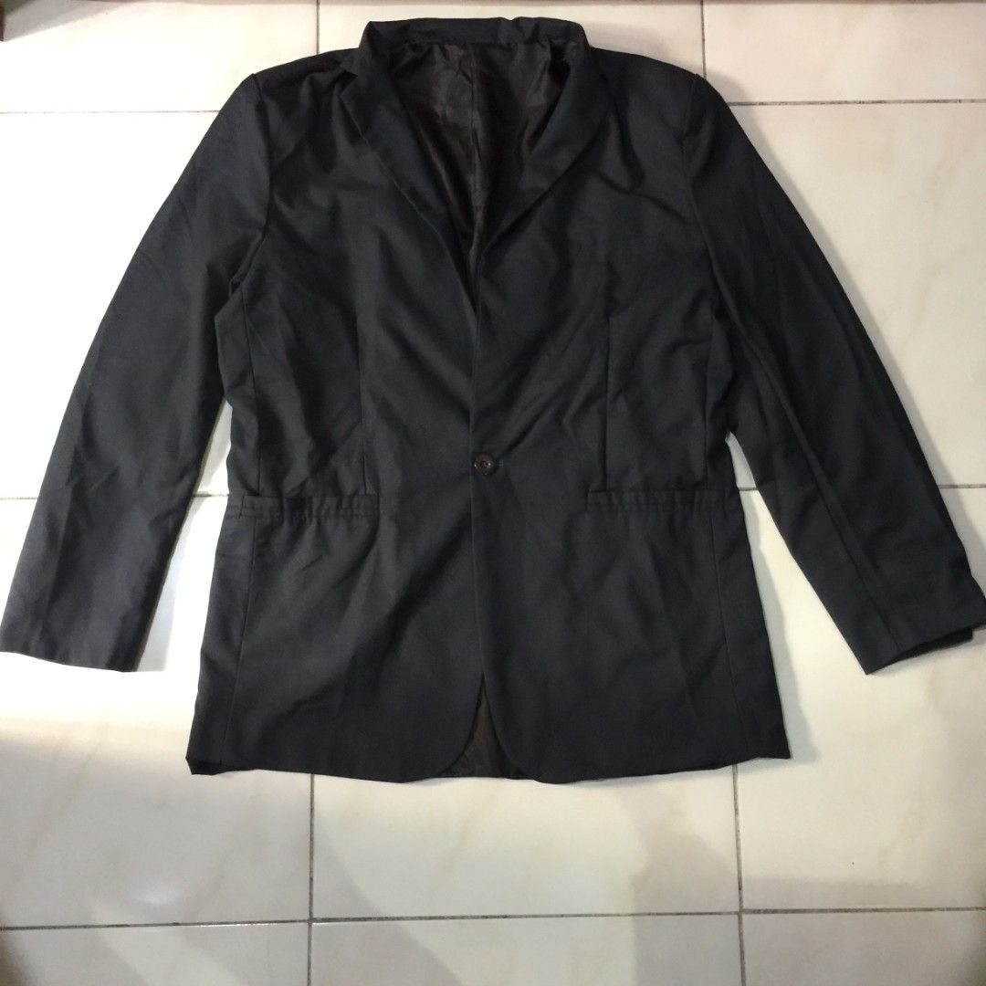 Dark Gray Single-button Suit Jacket Blazer / Corporate Blazer (Category: Coats, Jackets and Outerwear) located in Pasig City. Submitted by butfirst.declutter (Listing ID 1468595041, Image 1). Description: - Like new. No issue - Chest front pocket is design only - Fits L-XL men (3XL on tag) - Inner chest pocket - Single front button closure - Complete buttons - Color may vary due to lighting - See photos for measurements - Manage your expectations