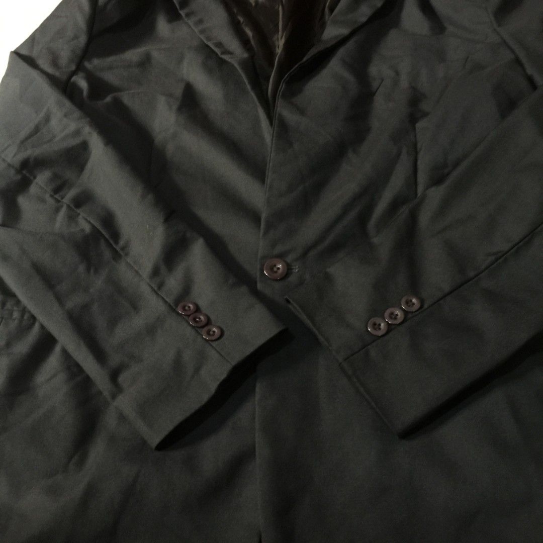 Dark Gray Single-button Suit Jacket Blazer / Corporate Blazer (Category: Coats, Jackets and Outerwear) located in Pasig City. Submitted by butfirst.declutter (Listing ID 1468595041, Image 3). Description: - Like new. No issue - Chest front pocket is design only - Fits L-XL men (3XL on tag) - Inner chest pocket - Single front button closure - Complete buttons - Color may vary due to lighting - See photos for measurements - Manage your expectations