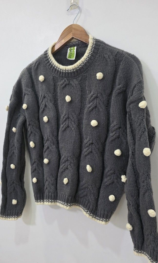 ​Dark Grey Cable Knit Sweater (Category: Coats, Jackets and Outerwear) located in Antipolo. Submitted by chimmychoo (Listing ID 1468654169, Image 2). Description: THRIFTED 🌼 SIZE: L-XL shoulders 24" width 23" length 19.5" no flaws.