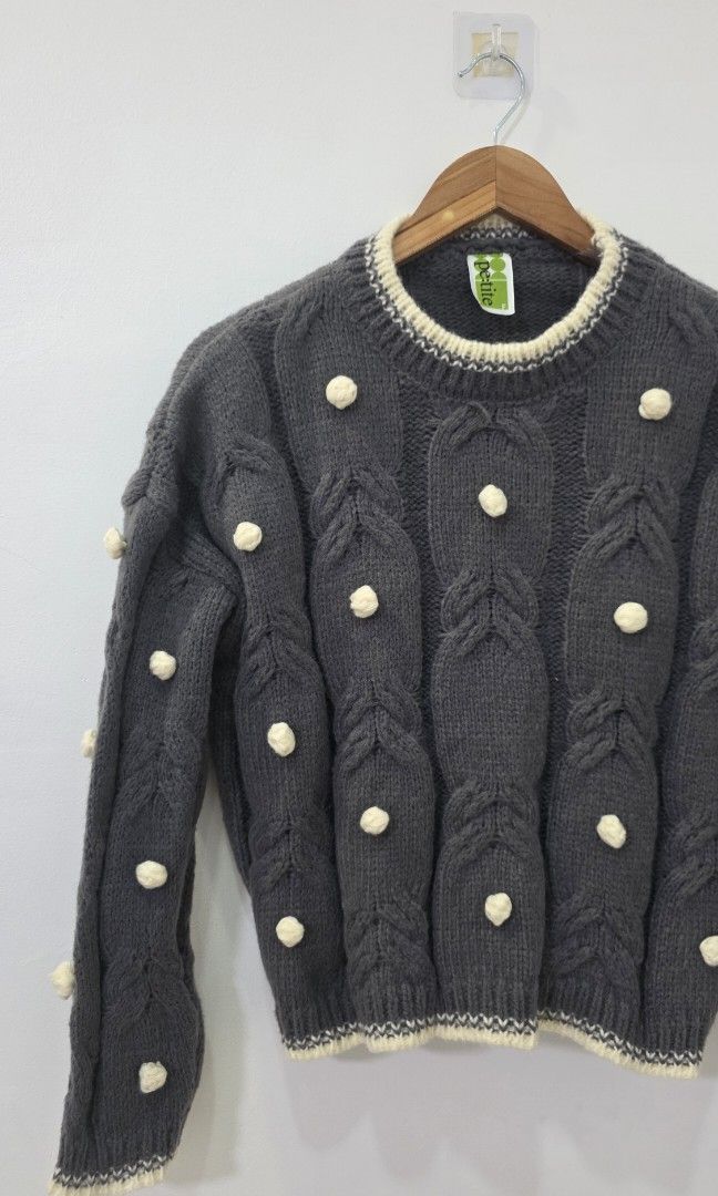 ​Dark Grey Cable Knit Sweater (Category: Coats, Jackets and Outerwear) located in Antipolo. Submitted by chimmychoo (Listing ID 1468654169, Image 3). Description: THRIFTED 🌼 SIZE: L-XL shoulders 24" width 23" length 19.5" no flaws.
