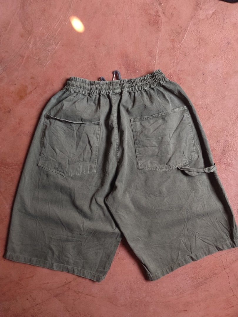 Dark Grey Casual jorts with Drawstring and Pockets (Category: Shorts) located in Tagoloan. Submitted by trueocean.8cd0d0 (Listing ID 1468528944, Image 2). Description: - Color: Dark grey - Fit: Relaxed, very roomy, and easy for everyday wear - Waistband: Elastic with adjustable drawstring - Pockets: Side patch pockets with loop detail plus two back patch pockets - Measurements: 24 inches length, 15.5 inches thigh, 13 inches hem.