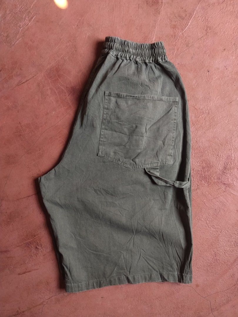 Dark Grey Casual jorts with Drawstring and Pockets (Category: Shorts) located in Tagoloan. Submitted by trueocean.8cd0d0 (Listing ID 1468528944, Image 3). Description: - Color: Dark grey - Fit: Relaxed, very roomy, and easy for everyday wear - Waistband: Elastic with adjustable drawstring - Pockets: Side patch pockets with loop detail plus two back patch pockets - Measurements: 24 inches length, 15.5 inches thigh, 13 inches hem.