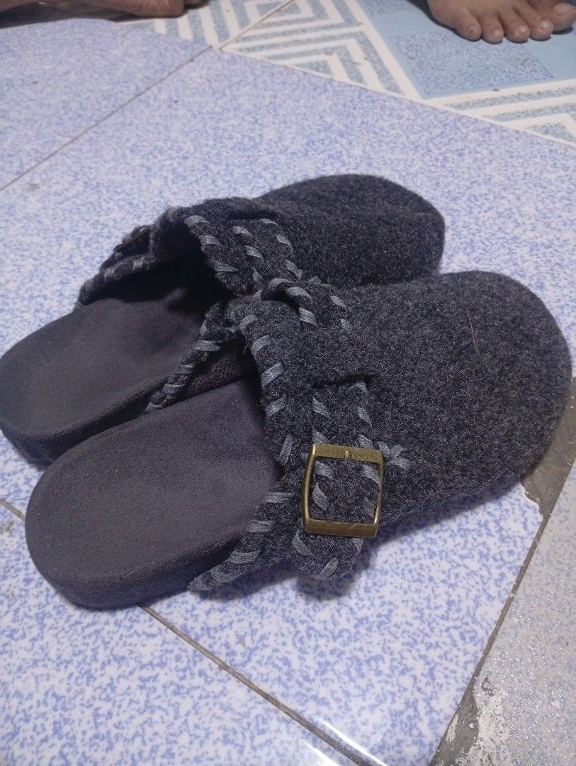 Dark Grey Felt Buckle Clogs Mule Slippers Size 39 (Category: Slippers and slides) located in Manila. Submitted by thehotness2.0 (Listing ID 1468598037, Image 1). Description: - Style: Birkenstock-style slip-on clogs - Color: Dark grey with contrast blanket stitching - Size: 39 - Material: Cozy wool-blend felt upper with textured black rubber outsole - Features: Decorative buckle strap for added style - Condition: Great for casual errands or home 