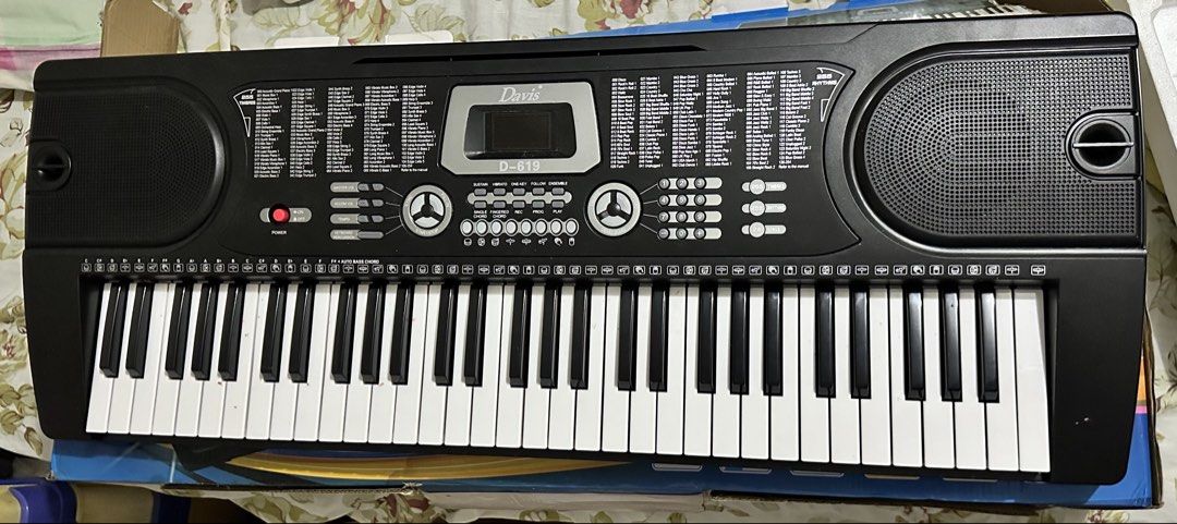 Davis D-619 61-Keys Teaching-Type Electronic Keyboard (Category: Musical Instruments) located in Bacoor. Submitted by qshoonie_cart (Listing ID 1468691892, Image 1). Description: 🎹 DAVIS D-619 61-Key Standard Piano Keyboard 🎹 Perfect for beginners, casual playing, practice, or anyone looking for an affordable keyboard at home! 🤍 ✨ Features: • 61 keys with LED display • 255 Timbres / 255 Rhythms • 24 Demonstration Songs • Keyboard Percussion / 