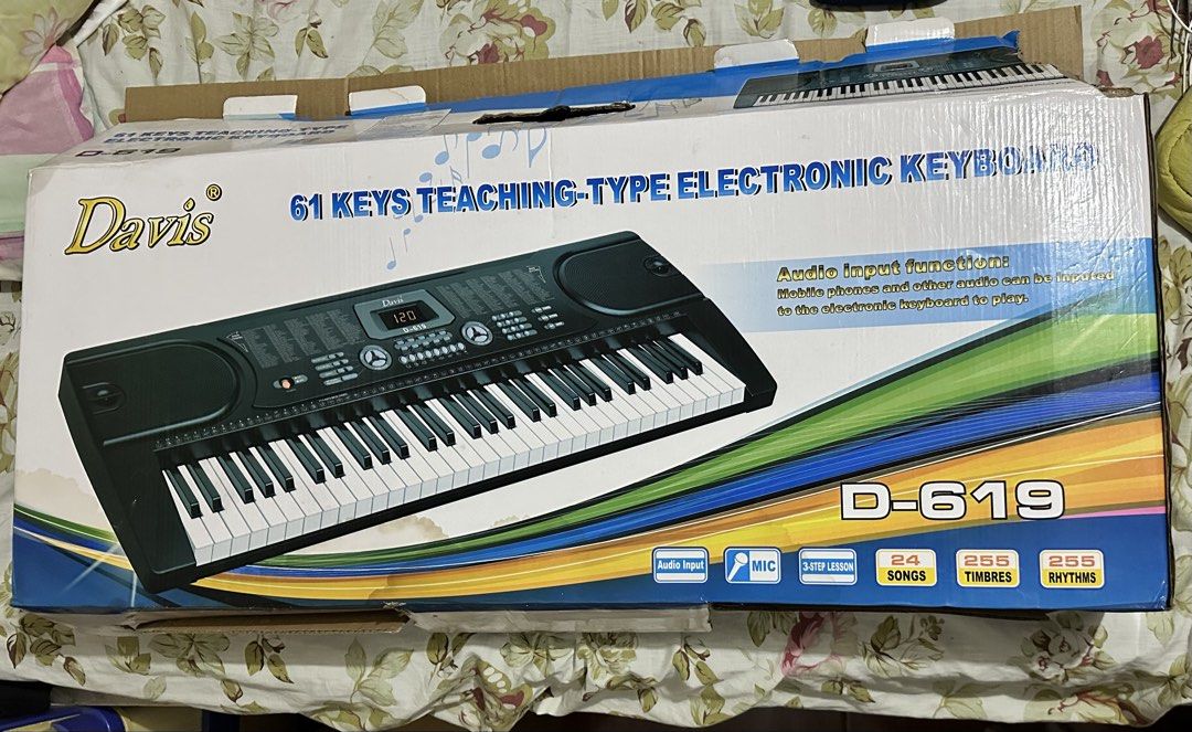 Davis D-619 61-Keys Teaching-Type Electronic Keyboard (Category: Musical Instruments) located in Bacoor. Submitted by qshoonie_cart (Listing ID 1468691892, Image 3). Description: 🎹 DAVIS D-619 61-Key Standard Piano Keyboard 🎹 Perfect for beginners, casual playing, practice, or anyone looking for an affordable keyboard at home! 🤍 ✨ Features: • 61 keys with LED display • 255 Timbres / 255 Rhythms • 24 Demonstration Songs • Keyboard Percussion / 
