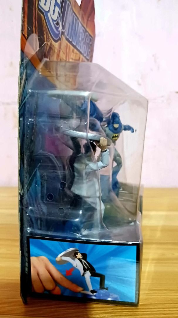 DC Universe Two-Face vs Batman (Category: Vintage Collectibles) located in Manila. Submitted by mickey_salonga (Listing ID 1468605951, Image 3). Description: - Brand: Mattel DC Universe - Item: Batman & Two-Face Action Figure Twin Pack - Features: Spring-loaded power features (Two-Face coin disk thrower, Batman projectile launcher) - Condition: Brand new, unopened packaging with minor shelf wear on the cardboard backing - Ideal for: DC Comics and