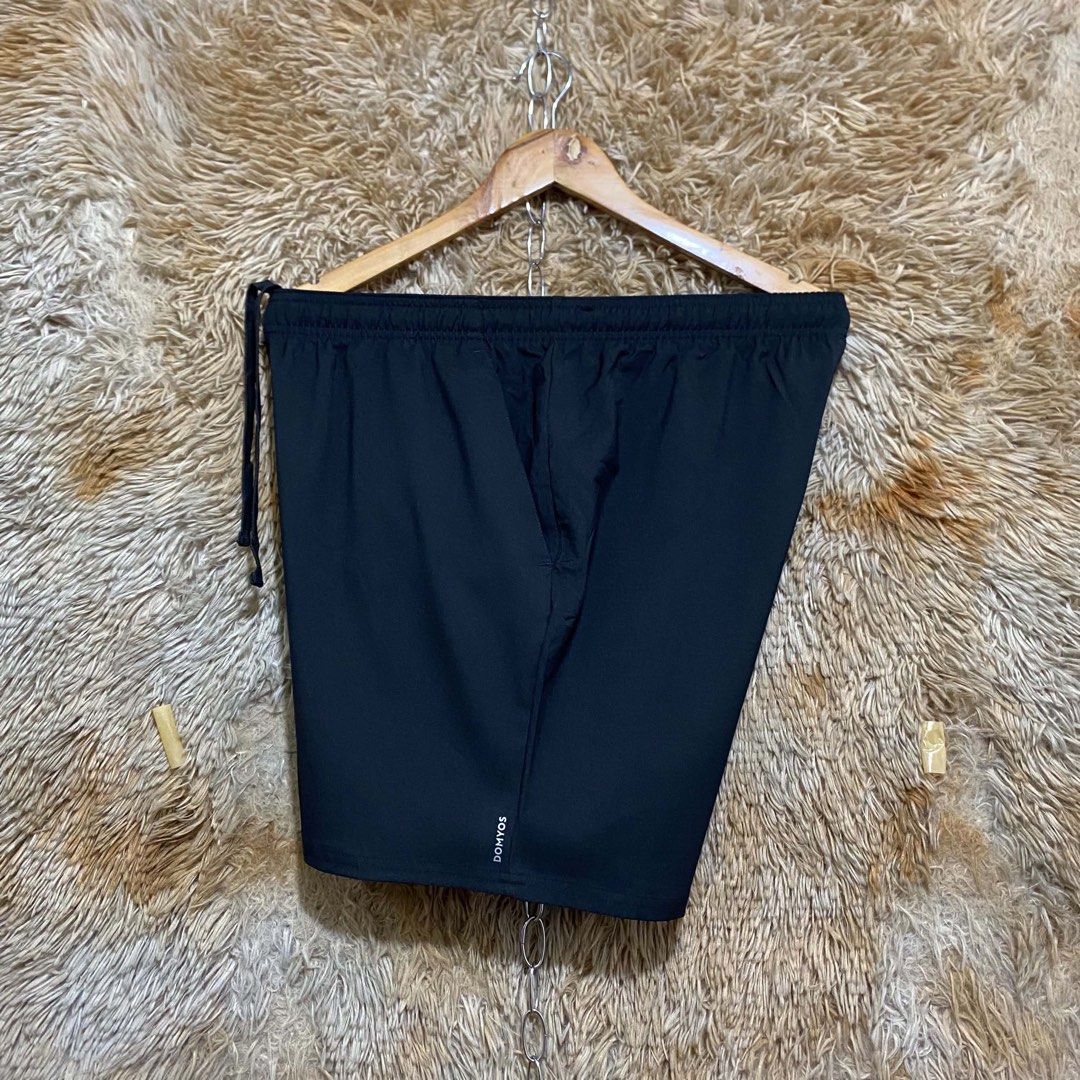 Decathlon Domyos Black Athletic Shorts with Drawstring (Category: Shorts) located in Butuan. Submitted by jc13thrifts (Listing ID 1468708749, Image 2). Description: - Brand: Domyos - Color: Black - Waistband: Elastic with adjustable drawstring - Pockets: Deep side pockets on both sides - Details: Clean branding print near the bottom hem - Material: Lightweight fabric, ideal for workouts or casual daily wear.