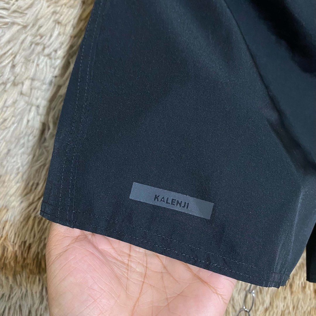 Decathlon Kalenji black running shorts with drawstring (Category: Shorts) located in Butuan. Submitted by jc13thrifts (Listing ID 1468708730, Image 3). Description: - Brand/Model: Kalenji athletic shorts - Color: Classic black - Condition: Clean, no tears or stains - Material: Lightweight and breathable fabric - Features: Elastic waistband with inside adjustable drawstring, small logo tag near left hem - Fit: Standard fit, easy to wash - Ideal fo