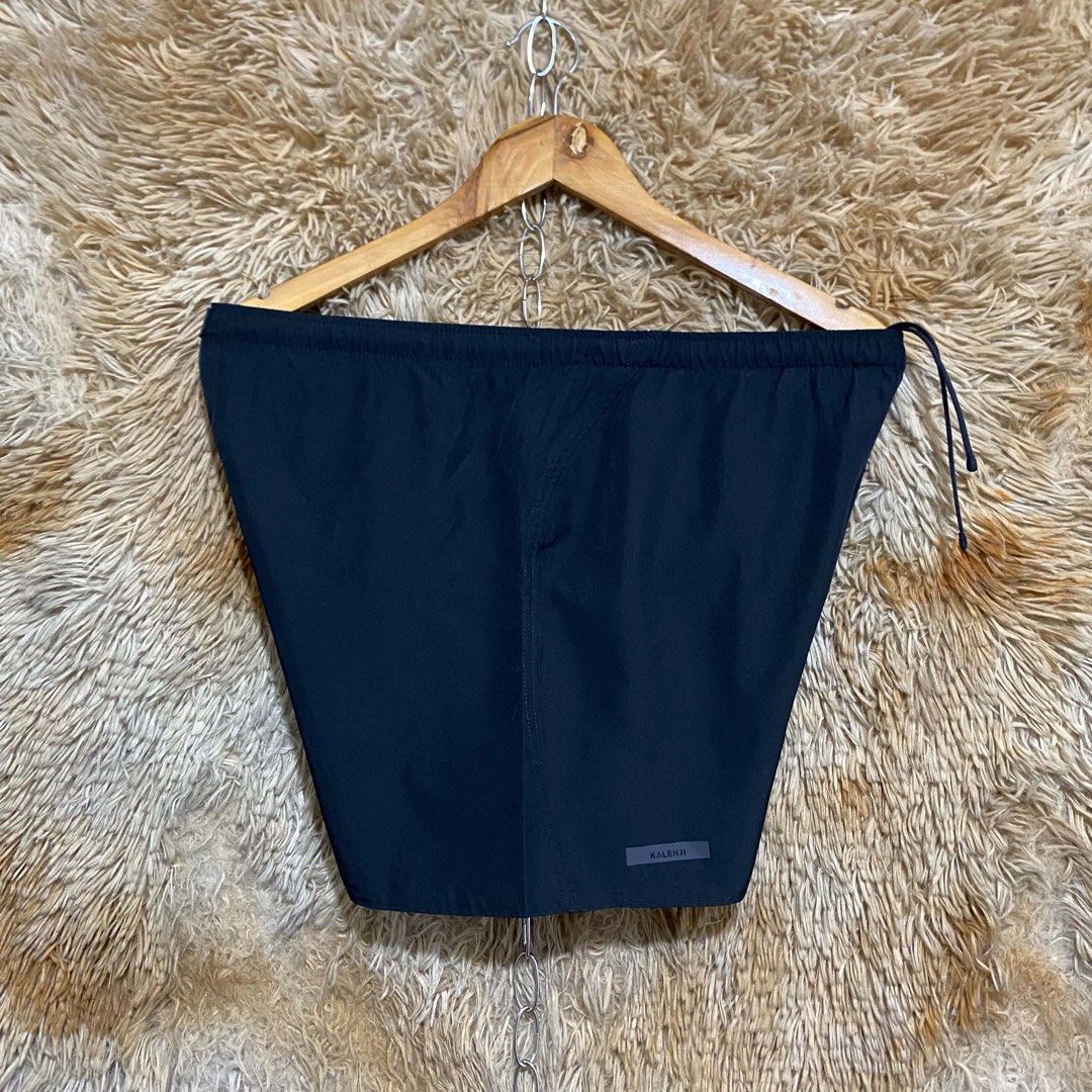 Decathlon Kalenji black running shorts with drawstring (Category: Shorts) located in Butuan. Submitted by jc13thrifts (Listing ID 1468708730, Image 2). Description: - Brand/Model: Kalenji athletic shorts - Color: Classic black - Condition: Clean, no tears or stains - Material: Lightweight and breathable fabric - Features: Elastic waistband with inside adjustable drawstring, small logo tag near left hem - Fit: Standard fit, easy to wash - Ideal fo