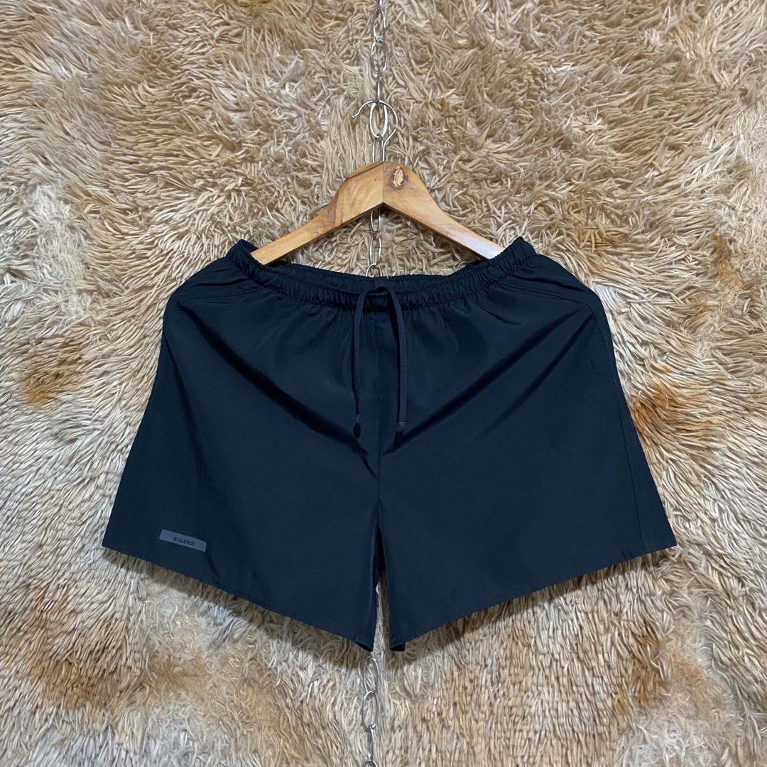 Decathlon Kalenji black running shorts with drawstring (Category: Shorts) located in Butuan. Submitted by jc13thrifts (Listing ID 1468708730, Image 1). Description: - Brand/Model: Kalenji athletic shorts - Color: Classic black - Condition: Clean, no tears or stains - Material: Lightweight and breathable fabric - Features: Elastic waistband with inside adjustable drawstring, small logo tag near left hem - Fit: Standard fit, easy to wash - Ideal fo