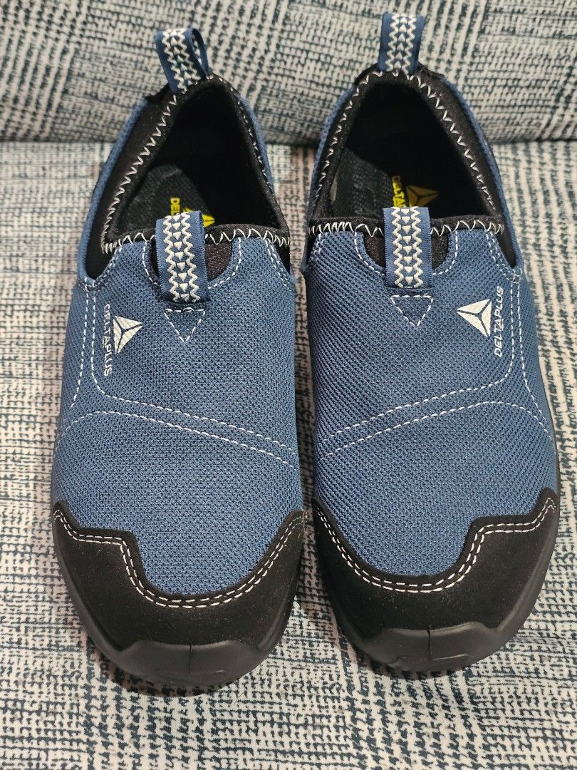 Delta Plus Blue Slip-On Work Shoes Size EU 39 (Category: Casual Shoes) located in San Mateo. Submitted by reyshel08 (Listing ID 1468529183, Image 1). Description: - Brand: Delta Plus - Type: Slip-on safety shoes - Color: Blue with black protective toe caps - Size: EU 39 / UK 6 / US 7 - Condition: Never worn, tags still attached - Features: Deep tread rubber outsoles and convenient heel pull tabs.