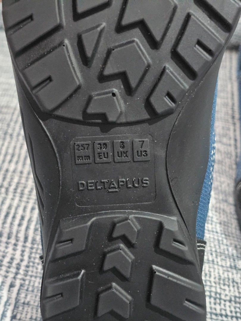 Delta Plus Blue Slip-On Work Shoes Size EU 39 (Category: Casual Shoes) located in San Mateo. Submitted by reyshel08 (Listing ID 1468529183, Image 3). Description: - Brand: Delta Plus - Type: Slip-on safety shoes - Color: Blue with black protective toe caps - Size: EU 39 / UK 6 / US 7 - Condition: Never worn, tags still attached - Features: Deep tread rubber outsoles and convenient heel pull tabs.