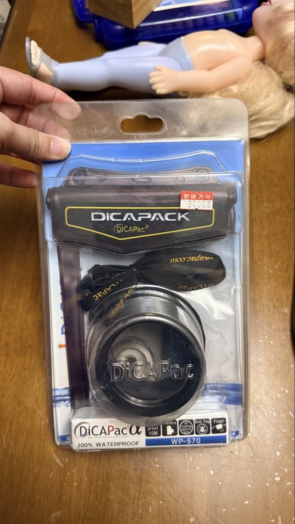 DiCAPac WP-570 Digital Camera Waterproof Case (Category: Cameras) located in Pilar. Submitted by faveanyshop (Listing ID 1468550071, Image 1). Description: - Brand new in original packaging: DiCAPac WP-570 waterproof digital camera case - Maximum protection: Waterproof up to 10 meters (33 feet) deep - Clear shots underwater: Features a UV-coated optical lens port and anti-fog system - Safe and secure: Floatable design prevents your camera from si