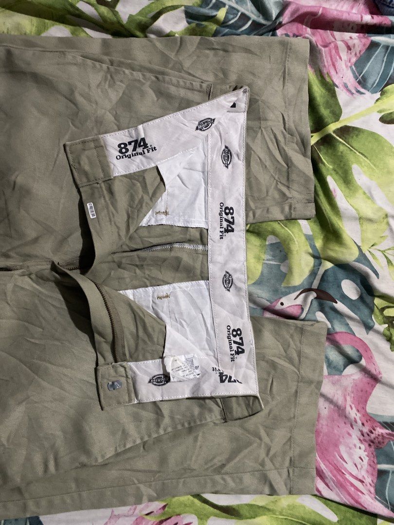 Dickies 874 Original Fit Khaki Work Pants Size 32 (Category: Chinos) located in Manila. Submitted by zhu.finds (Listing ID 1468705667, Image 3). Description: - Brand: Dickies - Model: 874 Original Fit Work Pants - Color: Khaki - Size: Tagged 32 - Material: 65% polyester, 35% cotton blend - Origin: Made in Mexico - Details: Classic straight leg, rear pocket with Dickies logo tag, clean interior waistband with printed branding - Condition: Solid ev