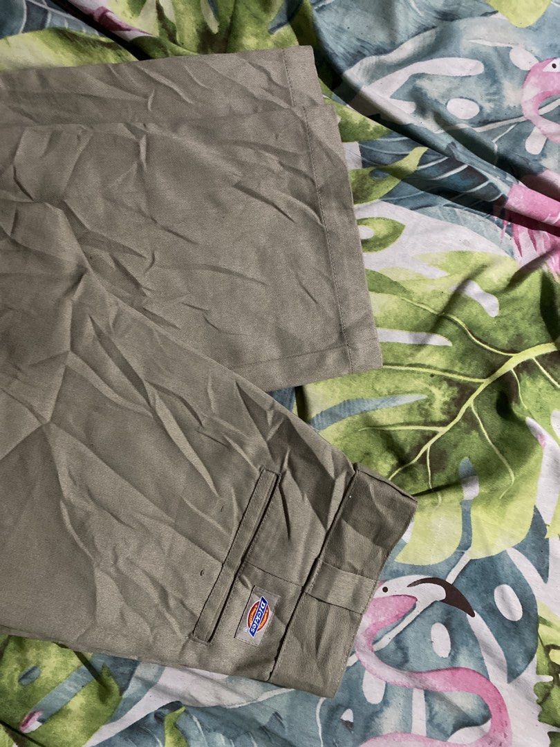Dickies Khaki Work Pants (Category: Trousers) located in Manila. Submitted by zhu.finds (Listing ID 1468705669, Image 2). Description: - Brand: Dickies - Color: Khaki - Style: Classic straight leg work pants - Features: Belt loops, zip fly, signature back logo tag, white fabric-lined inner waistband - Material: Durable, heavy-duty twill - Condition: Excellent, ready to wear - Perfect for: Casual wear, workwear, or streetwear looks.