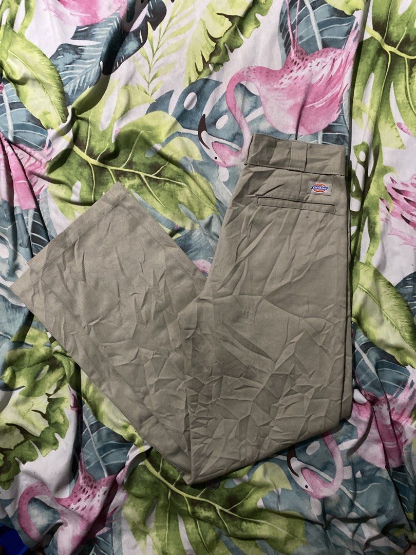 Dickies Khaki Work Pants (Category: Trousers) located in Manila. Submitted by zhu.finds (Listing ID 1468705669, Image 1). Description: - Brand: Dickies - Color: Khaki - Style: Classic straight leg work pants - Features: Belt loops, zip fly, signature back logo tag, white fabric-lined inner waistband - Material: Durable, heavy-duty twill - Condition: Excellent, ready to wear - Perfect for: Casual wear, workwear, or streetwear looks.