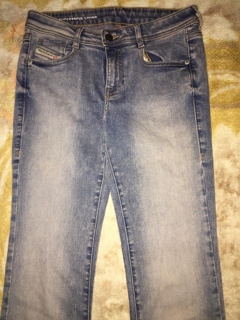 Diesel Bootcut/Flared Jeans (Category: Jeans) located in Dasmarinas. Submitted by pepperronnie (Listing ID 1468601147, Image 2). Description: This is a pair of Diesel Bootcut / Flared Jeans 👖 ✨ Style Details: - Cut: Bootcut / Flared — fitted through the hips and thighs, then gently widens from the knee down ​ - Brand: Diesel (you can see the iconic Diesel Industry leather patch at the back waist) ​ - Color: Light-wash blue denim with a soft, fad