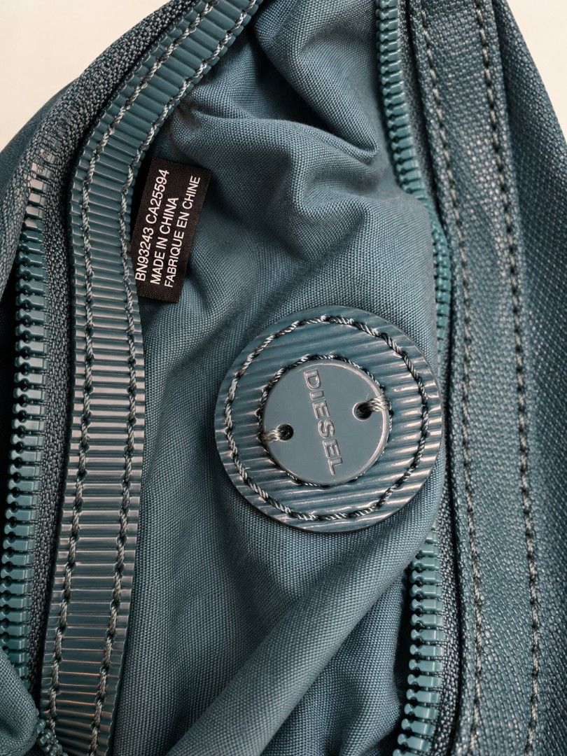 Diesel Y2k hobo bag (Category: Shoulder Bags) located in Manila. Submitted by littleclosetfindsmnl (Listing ID 1468543871, Image 2). Description: Vintage Y2K Diesel Hobo Shoulder Bag 🩵 Teal/turquoise vintage Diesel bag with signature circular turn-lock detail. Shows signs of wear and minimal scratches on hardware which is normal. Open to reasonable offers! ✨ RFS:Decluttering.