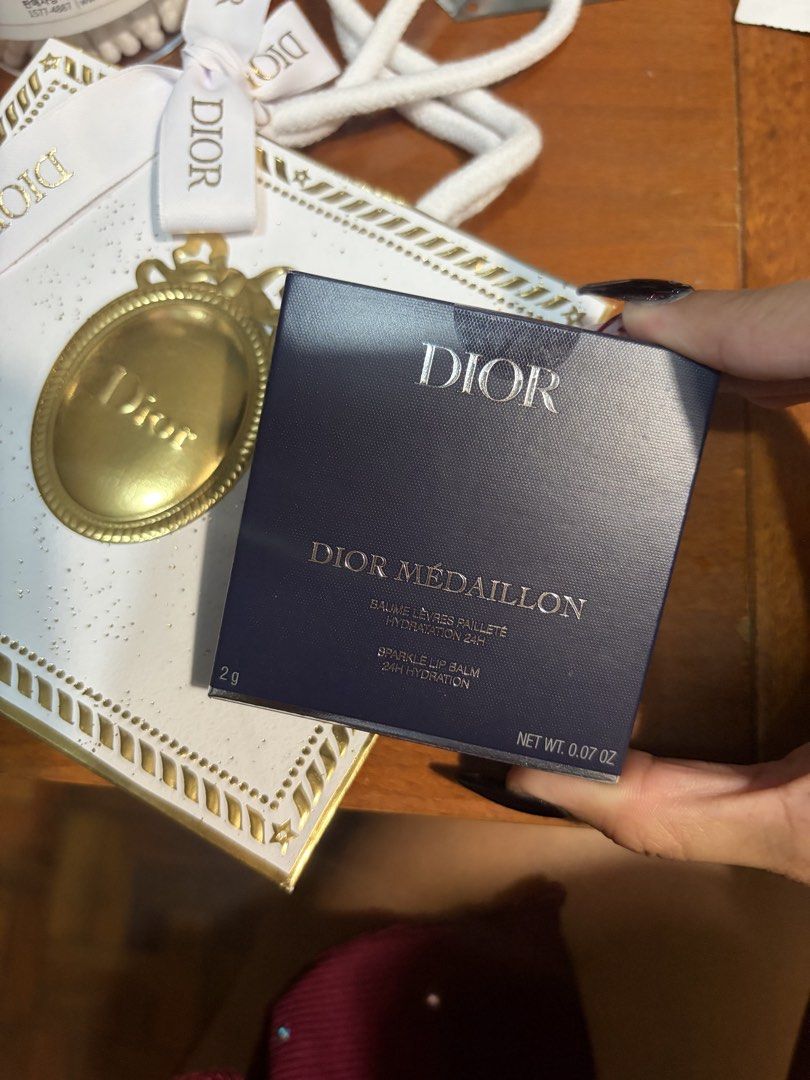 Dior Medaillon Sparkle Lip Balm 2g (Category: Makeup) located in Mandaluyong City. Submitted by benben12f (Listing ID 1468501682, Image 2). Description: - Authentic Dior Medaillon sparkle lip balm - Size: 2g (0.07 oz) - Condition: Brand new, unopened in pristine dark blue box - Includes holiday-style gift bag with elegant gold details and white ribbon - Perfect for gifts or your personal makeup collection - Meetup or shipping options available ac