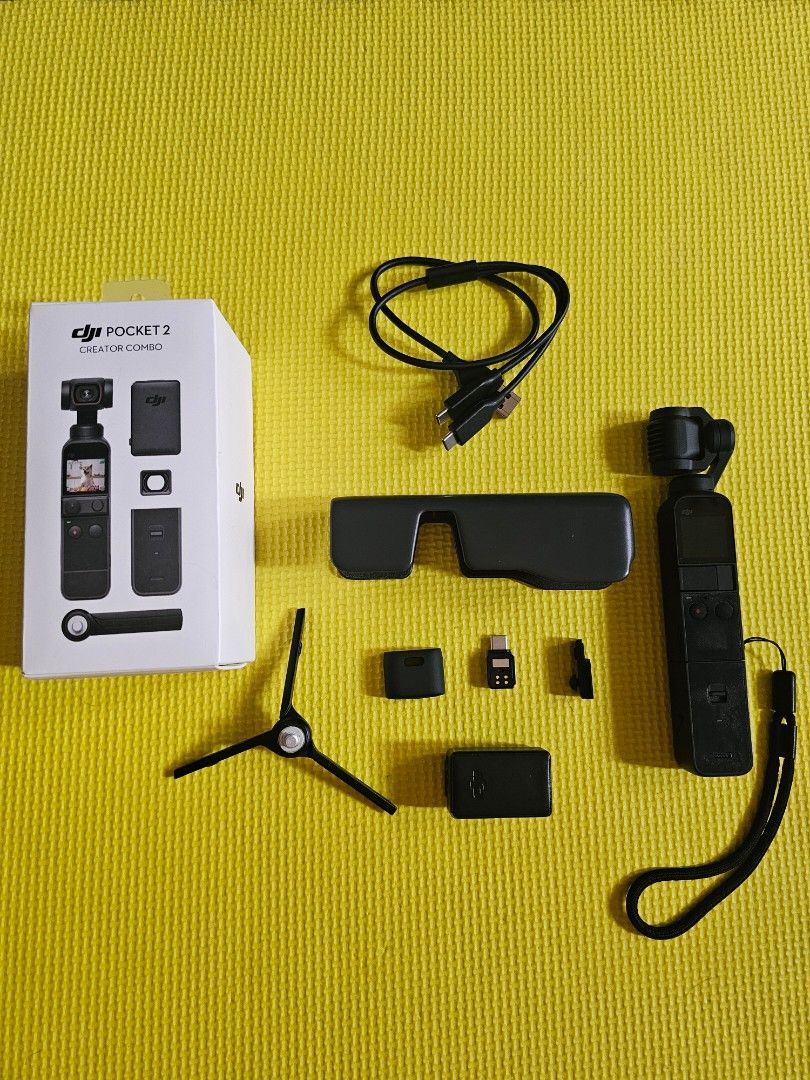 DJI Pocket 2 - Creator Combo (Category: Cameras) located in Makati City. Submitted by modrajaf (Listing ID 1468573431, Image 3). Description: DJI Pocket 2 - Creator Combo Complete with box and accessories EXCEPT mic windscreen No issue with unit and accessories Rfs: Upgrading to a newer model Price still negotiable "The DJI Pocket 2 is a compact, pocket-sized 3-axis motorized gimbal camera built for single-handed vlogging and smooth video capture