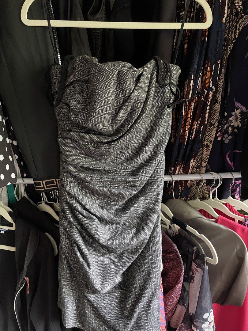 Dolce and Gabanna (Category: Luxury Apparel) located in Dumaguete. Submitted by jaymharr (Listing ID 1468512040, Image 1). Description: The selected region shows a gray and black herringbone-patterned strapless or tank-style ruched mini dress, resembling archival designs like the D&G by Dolce & Gabbana Wool Tweed Drapery Corset Strap Tank Top..