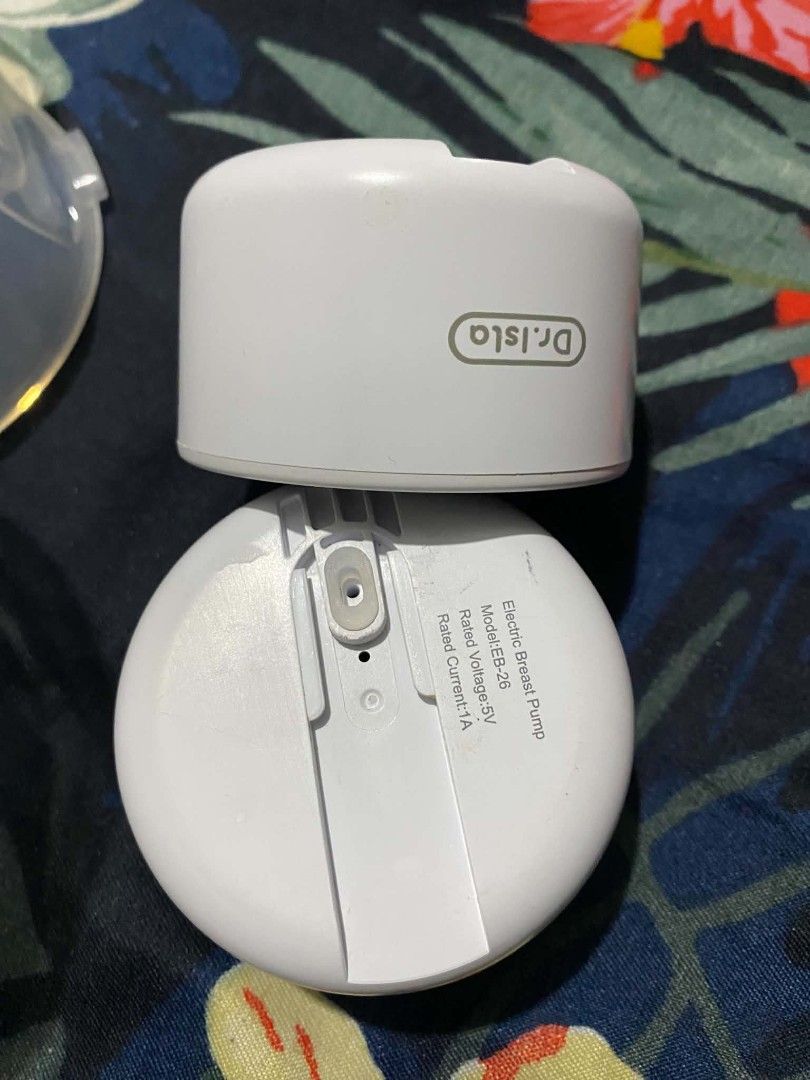 Dr. Isla Electric Breast Pump Model EB-26 (Category: Breastfeeding & Bottle Feeding) located in Caloocan City. Submitted by jjs.prelove (Listing ID 1468584738, Image 2). Description: - Brand/Model: Dr. Isla Electric Breast Pump EB-26 - Dual motor setup for efficient double pumping - Fully rechargeable with convenient top digital control buttons - Includes: 2 pump motors, silicone shields, tubing, and charging cable - Bonus: Comes with unopened, b