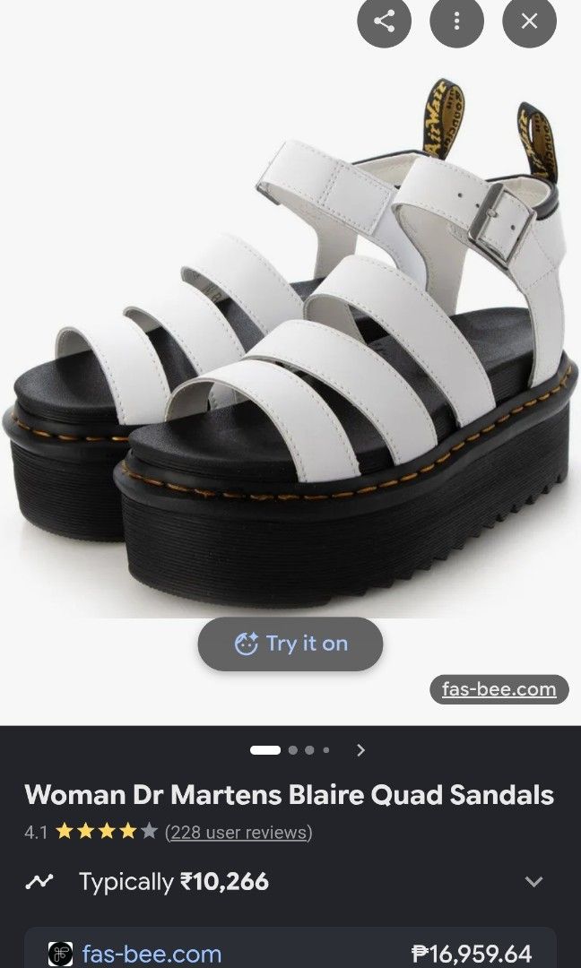 Dr. Martens White Platform Sandals (Category: Sandals) located in Iligan City. Submitted by sabaylestephanie0 (Listing ID 1468699373, Image 1). Description: - Brand: Dr. Martens - Style: Multi-strap platform sandals - Color: White with chunky black ribbed sole - Details: Signature yellow welt stitching and branded heel loop - Fit: Adjustable buckle strap for a secure fit - Comfort: Extra height with everyday wearability.