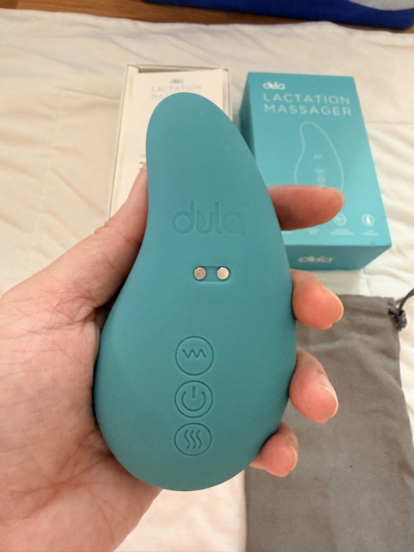 Dula Lactation Massager with Warming and Vibration (Category: Breastfeeding & Bottle Feeding) located in Antipolo. Submitted by mrgvictoria (Listing ID 1468560882, Image 2). Description: - Item: Dula Lactation Massager - Color: Teal Blue - Features: 10 vibration modes and 3 heat levels (45°C - 55°C) to relieve clogged ducts and aid nursing - Material: Safe, BPA-free liquid silicone - Waterproof: IPX7 waterproof rating for easy cleaning - Inclusio