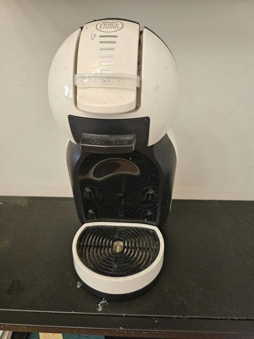 Dulce Gusto (Category: Coffee Machines & Makers) located in Manila. Submitted by ezrapaeste (Listing ID 1468601637, Image 1). Description: Move out sale no issues.