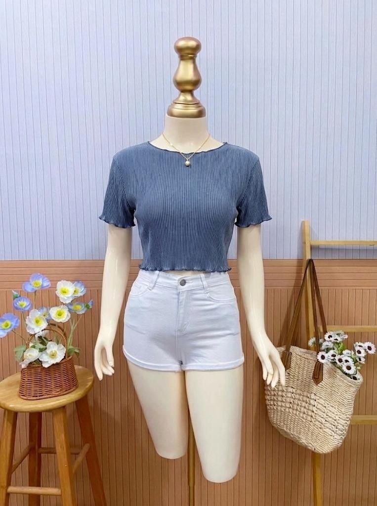 Dusty Blue Lettuce-Trim Pleated Crop (Category: Blouses) located in Roxas City. Submitted by blairnstyle (Listing ID 1468613248, Image 1). Description: Color: Dusty Blue / Slate Blue ​Neckline: Round neckline ​Sleeves: Short sleeves with delicate lettuce-edge hems ​Hemline: Cropped length featuring a matching lettuce-edge finish ​Fabric & Texture: Fine accordion-pleated / ribbed texture with good stretch ​Style: Casual, chic, and easy to pair wit