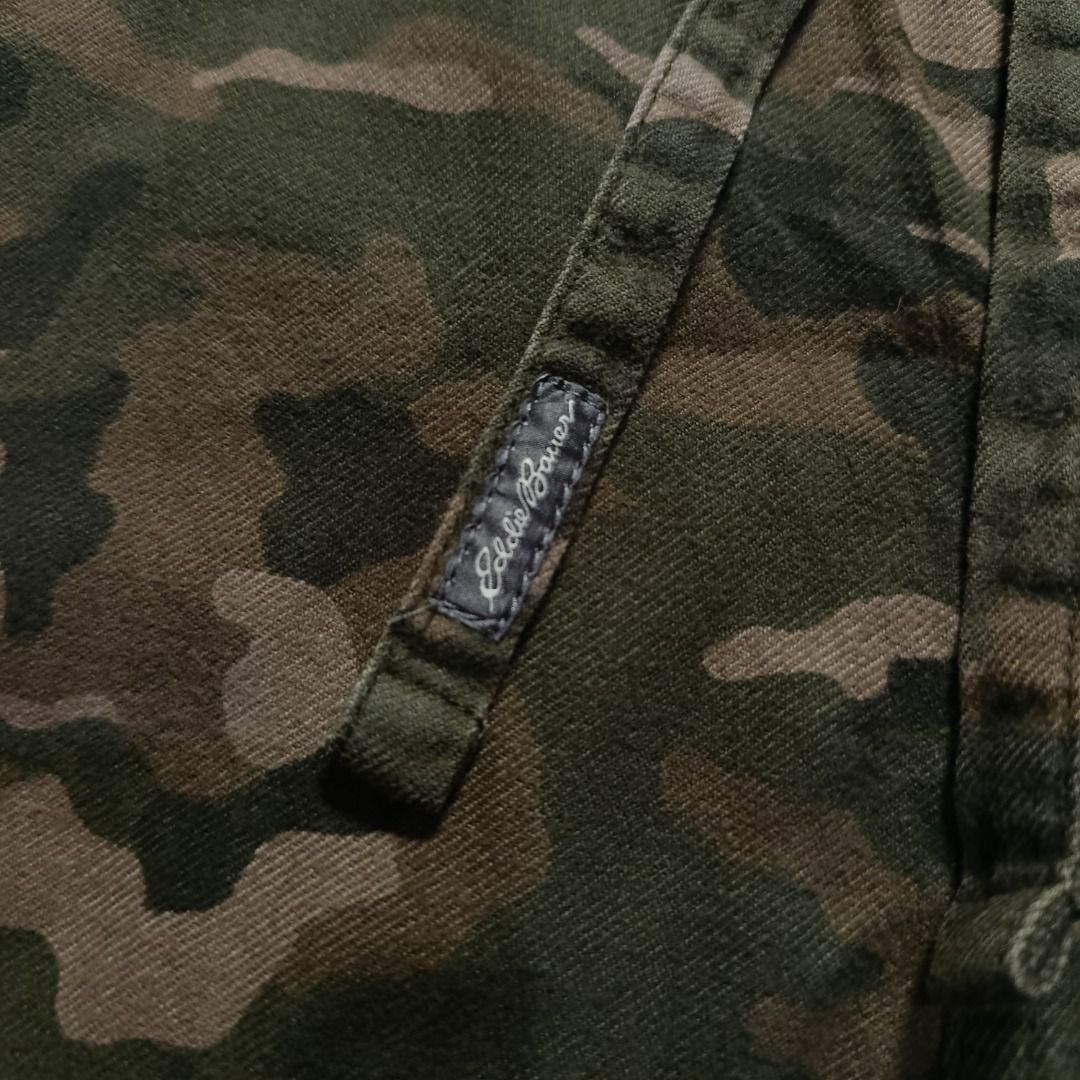 Eddie Bauer Camouflage Straight-Leg Pants (Category: Joggers) located in Taytay. Submitted by hoodgrail.vtg (Listing ID 1468606601, Image 3). Description: • Good condition - Lightly used • Earth-tone camouflage print with classic straight-leg fit • Size on tag: M — best fits 36–38 • Measurements: 19 x 41 in • Leg opening: 9 in • Color rate: 9/10 • Issue: Loose threads and fraying at hem.