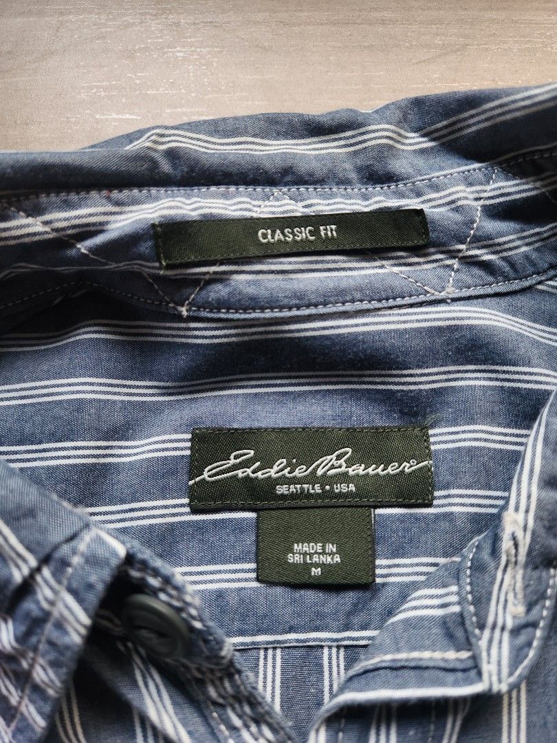 Eddie Bauer Oversized Shirt Jacket (Category: Tshirts & Polo Shirts ) located in Quezon City. Submitted by zero_two_seven (Listing ID 1468568974, Image 3). Description: - Brand: Eddie Bauer - Color: Bluish Gray - Size: M (Oversized) - 30 Front L 32 Back L x 22 W - Condition: 8/10 - Minimal Usage - Color may differ from the photos - Shipping fee is shouldered by the buyer.