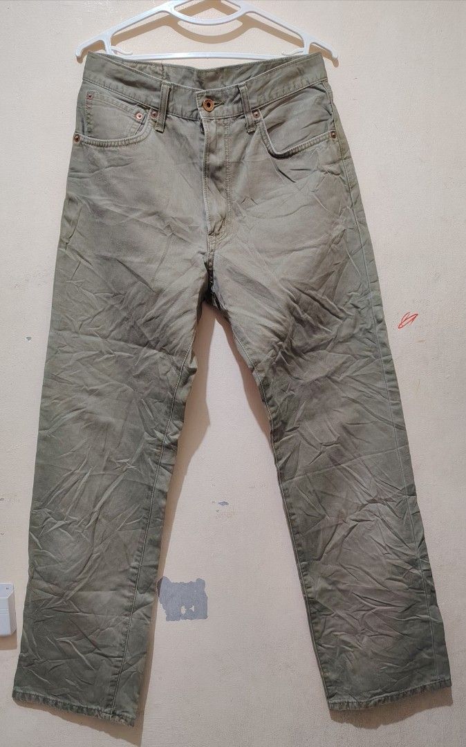Edwin 5575 Olive Green Casual Pants (Category: Trousers) located in Manila. Submitted by forthriftstorewarriors (Listing ID 1468580017, Image 1). Description: - Brand/Model: Edwin 5575 pants - Color: Olive Green - Size: Tagged 32 x 34 - Actual Measurements: 30" waist, 41.5" length - Style Code: EKS-1851 - Details: Standard button fly and durable riveted pockets - Condition: Beautiful natural fading and creases from wear and washing.