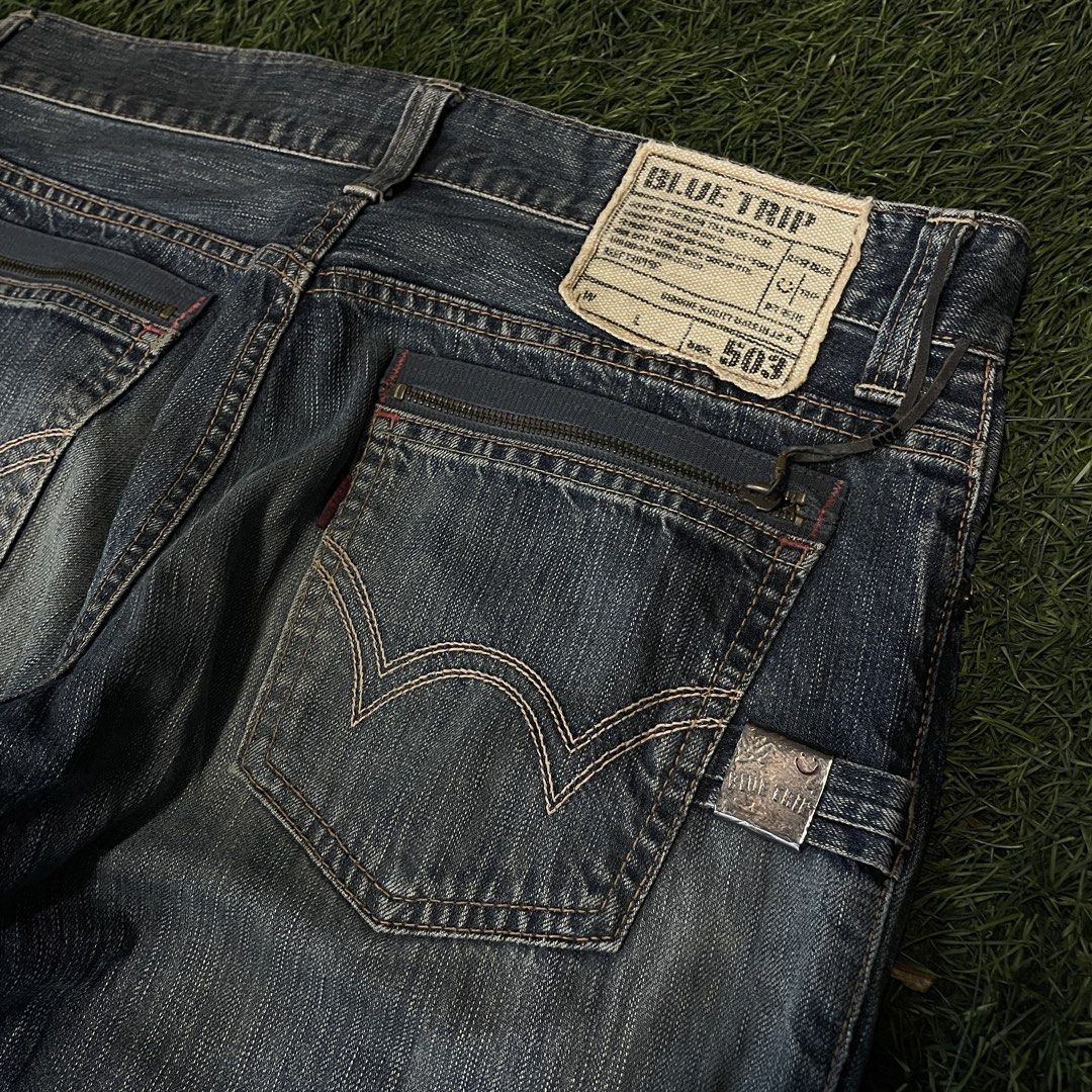 Edwin Blue Trip 503 Distressed Denim Jeans (Category: Jeans) located in Pasig City. Submitted by icie_finds (Listing ID 1468621778, Image 3). Description: Edwin Blue Trip 503 Distressed Denim Jeans SIZE: Tagged 32x32 (Fits 36 Waist) DIMES: Waist: 36 inches Length: 41.5 inches Leg Opening: 8.5 inches Style: Vintage Japanese distressed straight-leg denim jeans with custom back zip-pockets, contrast red accent zipper tape, and classic wash detailing