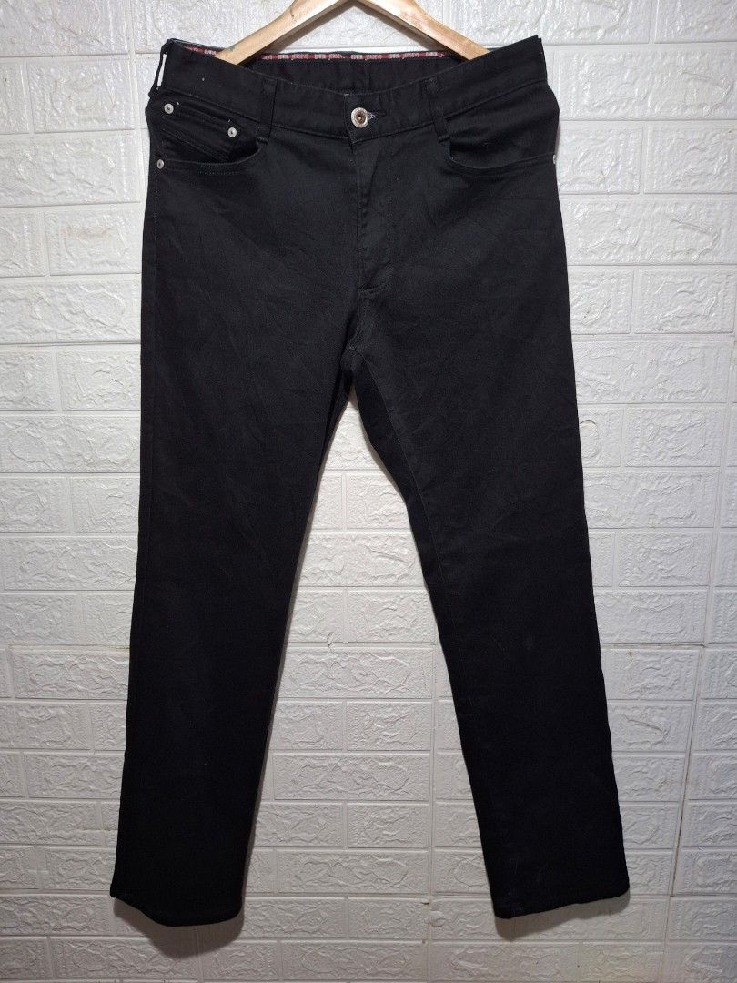 EDWIN Jerseys Black Denim Jeans (Category: Jeans) located in Angeles City. Submitted by livemountain.e2ae07 (Listing ID 1468569702, Image 1). Description: - Brand: EDWIN Jerseys - SIZE MEDIUM - W16.2 L42 HEM 8 - Color/Wash: Dark wash black denim with visible stretch weave texture - Style: Classic 5-pocket design - Hardware: Branded metal buttons and rivets - Details: Distinctive red interior waistband taping and embossed red leather back patch - 