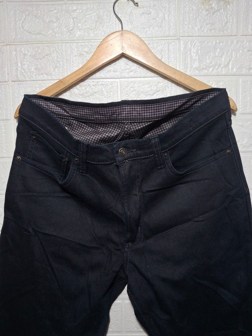 EDWIN Wildfire 403 Black Denim Jeans Size 35 (Category: Jeans) located in Angeles City. Submitted by livemountain.e2ae07 (Listing ID 1468560654, Image 2). Description: - Brand: EDWIN Wildfire - Model: 403 - Size: 35 waist - W17.4 L39.3 HEM 8 - Color: Dark wash black denim - Interior: Houndstooth thermal lining for extra warmth in cold weather - Origin: Made in Japan - Details: Button closure with branded hardware, leather patch at back waistband 