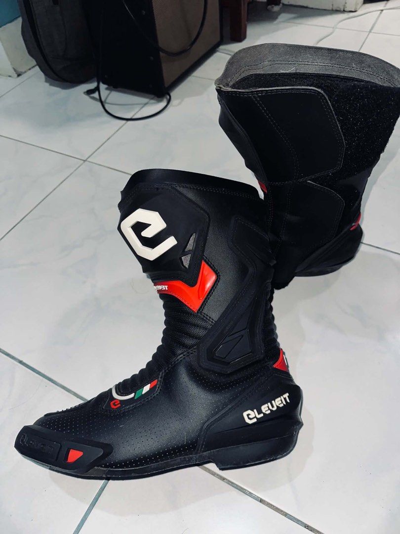 Eleveit Motorcycle Boots Black Red (Category: Boots) located in Lucena. Submitted by ch3rrypuff (Listing ID 1468605598, Image 2). Description: - Brand: Eleveit Motorcycle Riding Boots - Color: Black with stylish red and white accents + Italian flag detail - Protection: Hard plastic shin guards and built-in ankle support panels - Comfort & Ventilation: Perforated leather panels for optimal airflow - Closure: Convenient and secure back zipper with 