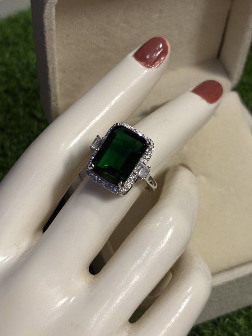 Emerald gemstone ring (Category: Rings) located in Davao. Submitted by emmanuelchuamellorin23 (Listing ID 1468668058, Image 2). Description: 💚emerald ring gemstone 6ct Size7 adjustable Markings 925 Rodium/ Platinum over copper based metal Tarnish resistant with extra care Message me directly📩.