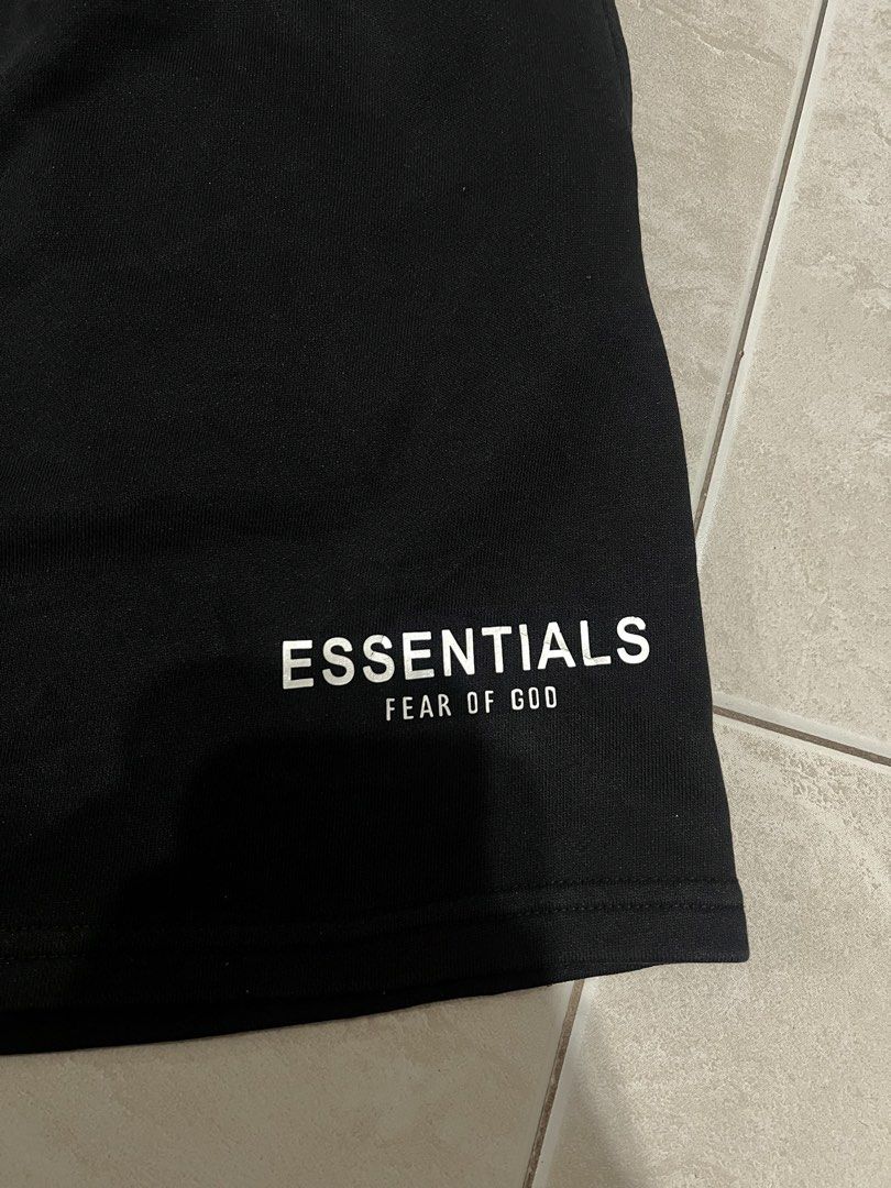 Essentials (Category: Shorts) located in Valenzuela. Submitted by grb_thrift23 (Listing ID 1468597339, Image 3). Description: Essentials Size M on tag Waist: 28-32 Length: 17 Excellent condition 9.5/10 color rate Issue: minimal crack on print, runs/pinhole.