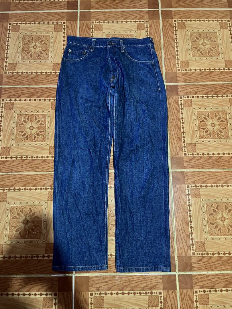 Evisu Denim Jeans Button Fly Dark Wash (Category: Jeans) located in Kidapawan. Submitted by azythrift (Listing ID 1468695821, Image 1). Description: - Brand: Evisu - Color: Deep blue indigo (Raw denim texture) - Material: 100% Cotton with visible selvedge ID - Fit: Standard straight leg - Details: Classic button fly with branded hardware - Condition: Clean interiors and original tags intact.