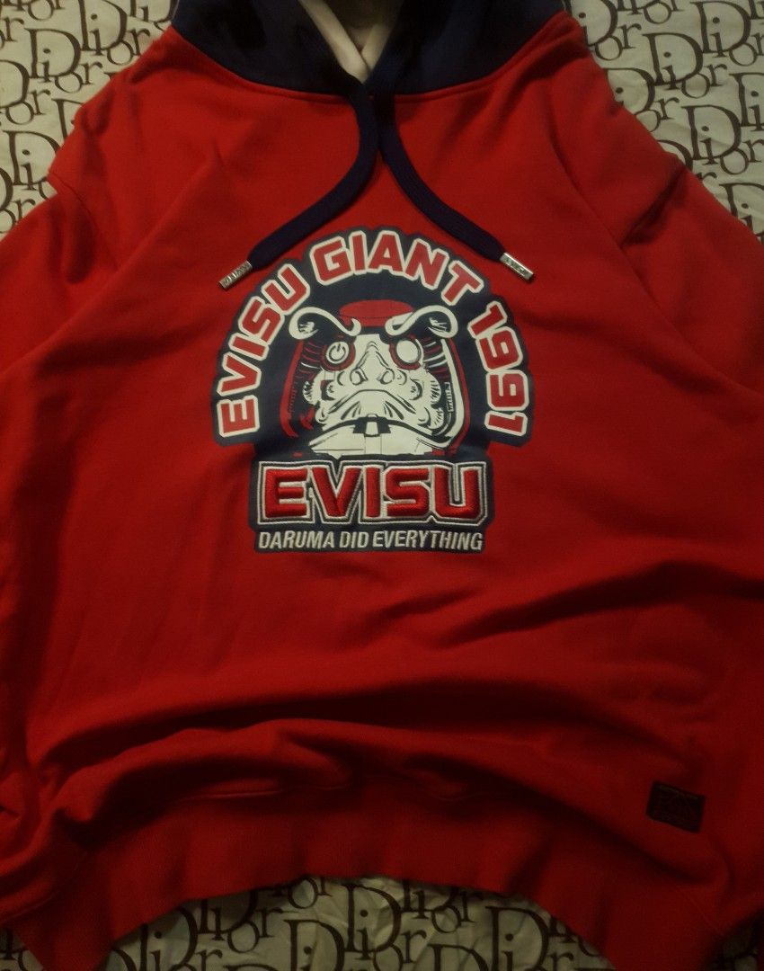 Evisu hoodie 2 tone embroidered (Category: Coats, Jackets and Outerwear) located in San Fernando. Submitted by retro.district. (Listing ID 1468708709, Image 2). Description: - Evisu 2 tone hoodie embroidered design - Size: XL (25x30) - Condition: Excellent - No issue - Color Rate: 9.5/10.