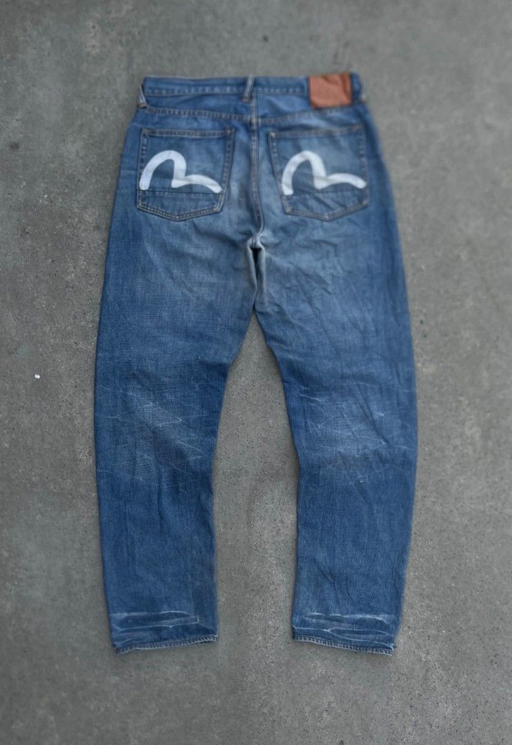 Evisu Pants (Category: Jeans) located in Santa Barbara. Submitted by kelcardenas14 (Listing ID 1468663496, Image 1). Description: Waist 35 Length 40 Thigh 13 Hem 8.5 Issue: Scratch Heel Drag, Replaced Bottones.