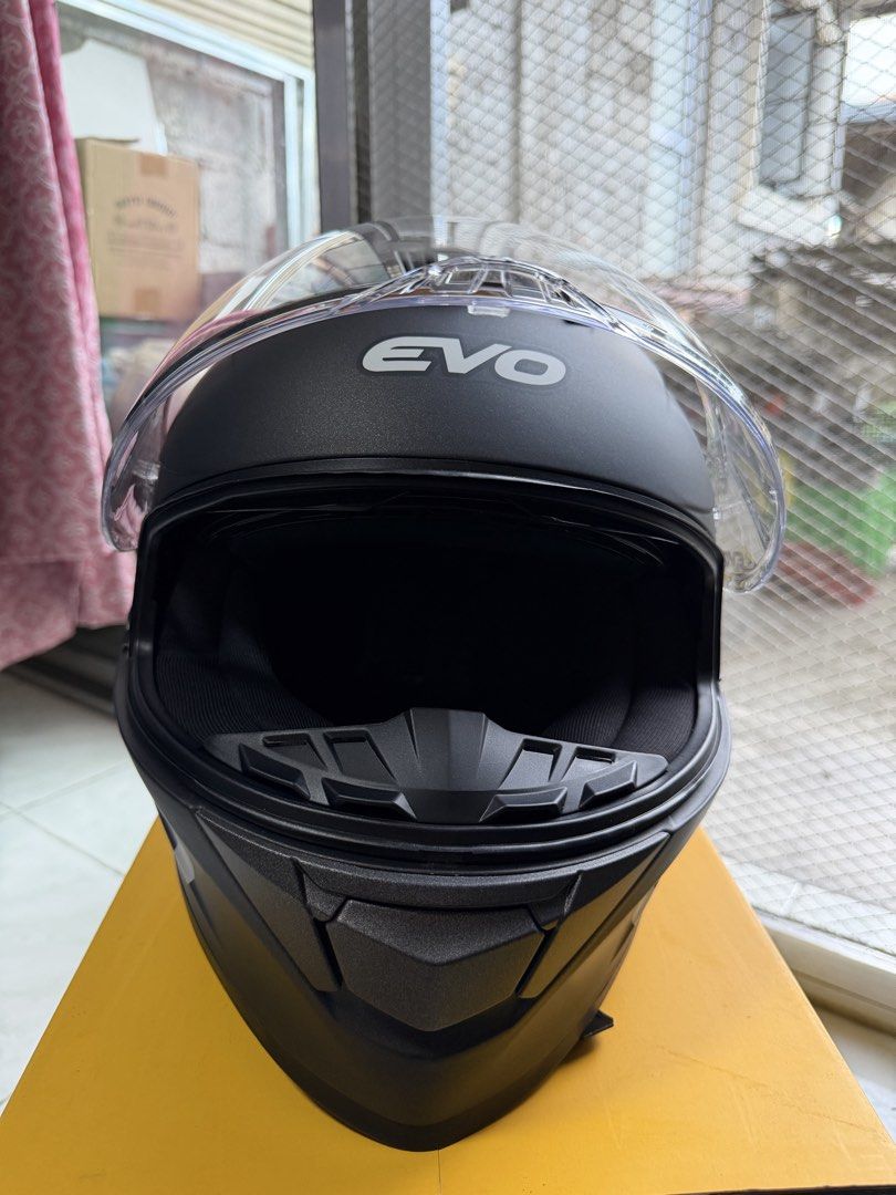 Evo GT-Pro Matte Black Full Face Helmet Size L (Category: Bicycles) located in Quezon City. Submitted by declutter2022_ (Listing ID 1468584431, Image 2). Description: - Model: Evo GT-Pro Full Face Helmet - Color: Matte Black - Size: Large - Safety: ECE R22.06 certified with Final QC passed sticker - Visor: Clear, flips up smoothly - Condition: Clean interior padding, secure chin strap buckle - Inclusions: Original yellow box, sticker, dust bag - 