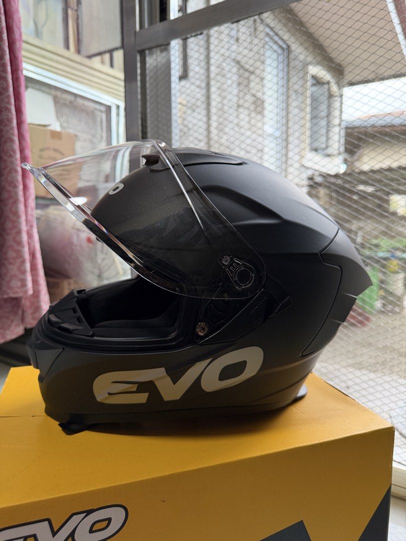 Evo GT-Pro Matte Black Full Face Helmet Size L (Category: Bicycles) located in Quezon City. Submitted by declutter2022_ (Listing ID 1468584431, Image 3). Description: - Model: Evo GT-Pro Full Face Helmet - Color: Matte Black - Size: Large - Safety: ECE R22.06 certified with Final QC passed sticker - Visor: Clear, flips up smoothly - Condition: Clean interior padding, secure chin strap buckle - Inclusions: Original yellow box, sticker, dust bag - 