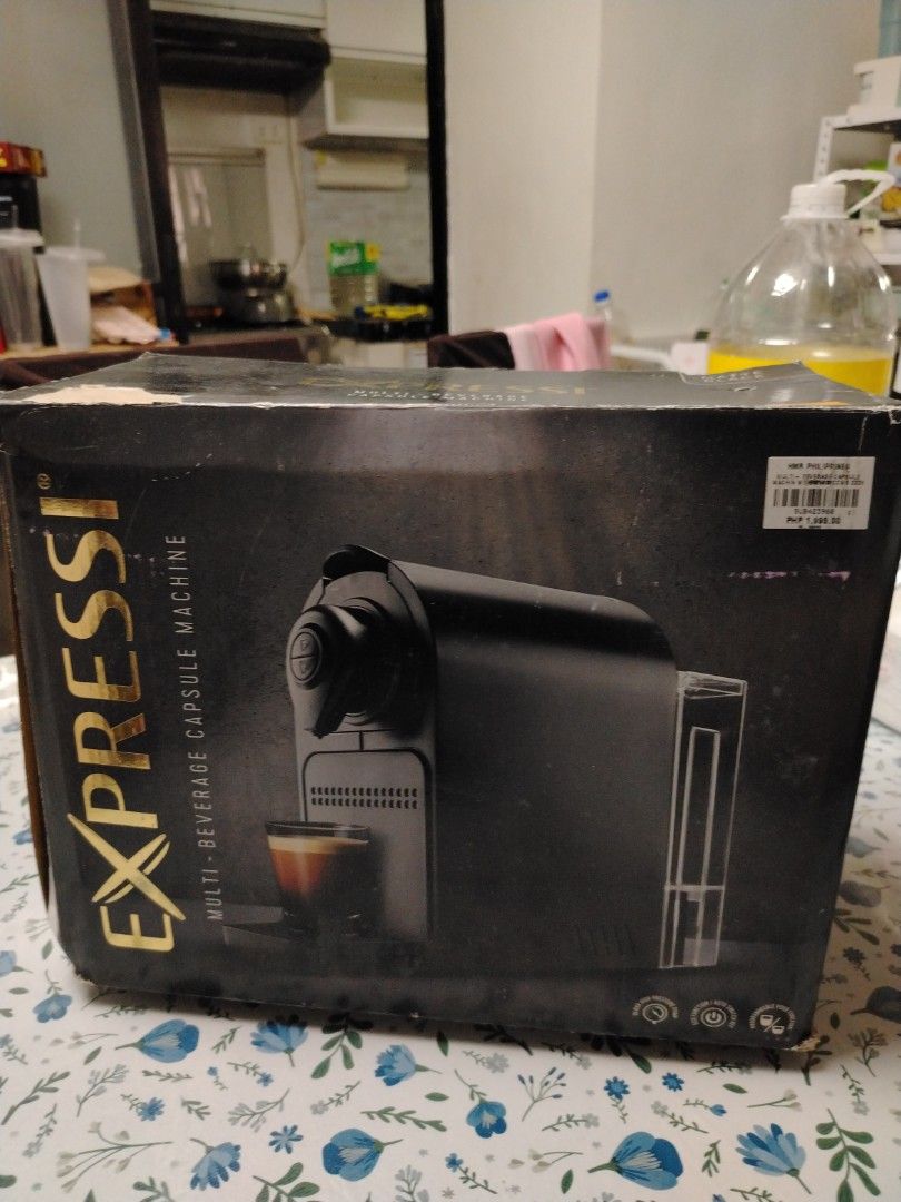EXPRESSI Multi-Beverage Capsule Machine (Category: Coffee Machines & Makers) located in Castillejos. Submitted by jheaya (Listing ID 1468541805, Image 1). Description: - EXPRESSI multi-beverage capsule machine - Brand new and unused inside the original box - Box shows minor wear from storage - Perfect for making quick espresso and other drinks at home - Great addition to any kitchen coffee routine.