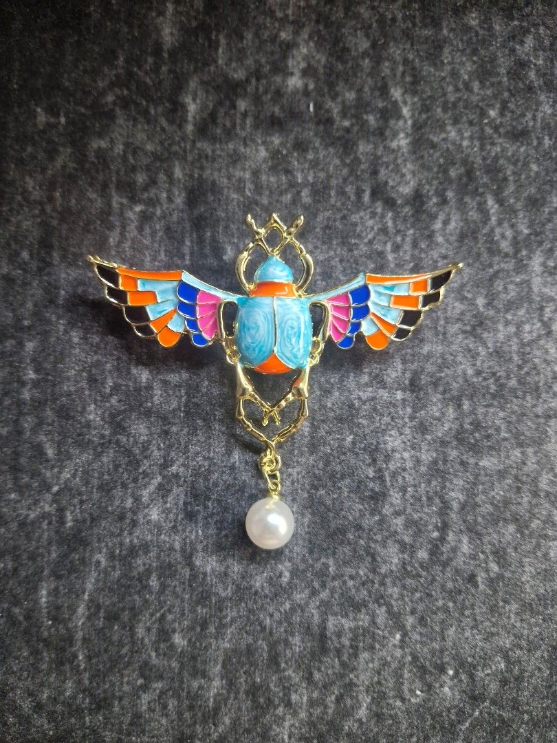 Eyptian Scarab Brooch (Category: Brooches) located in Taguig. Submitted by mommaschoice (Listing ID 1468581218, Image 1). Description: Brand New Unisex Use Adorned w/ faux pearl Adds elegance to one's outfit Lightweight won't damage the fabric Ships nationwide.