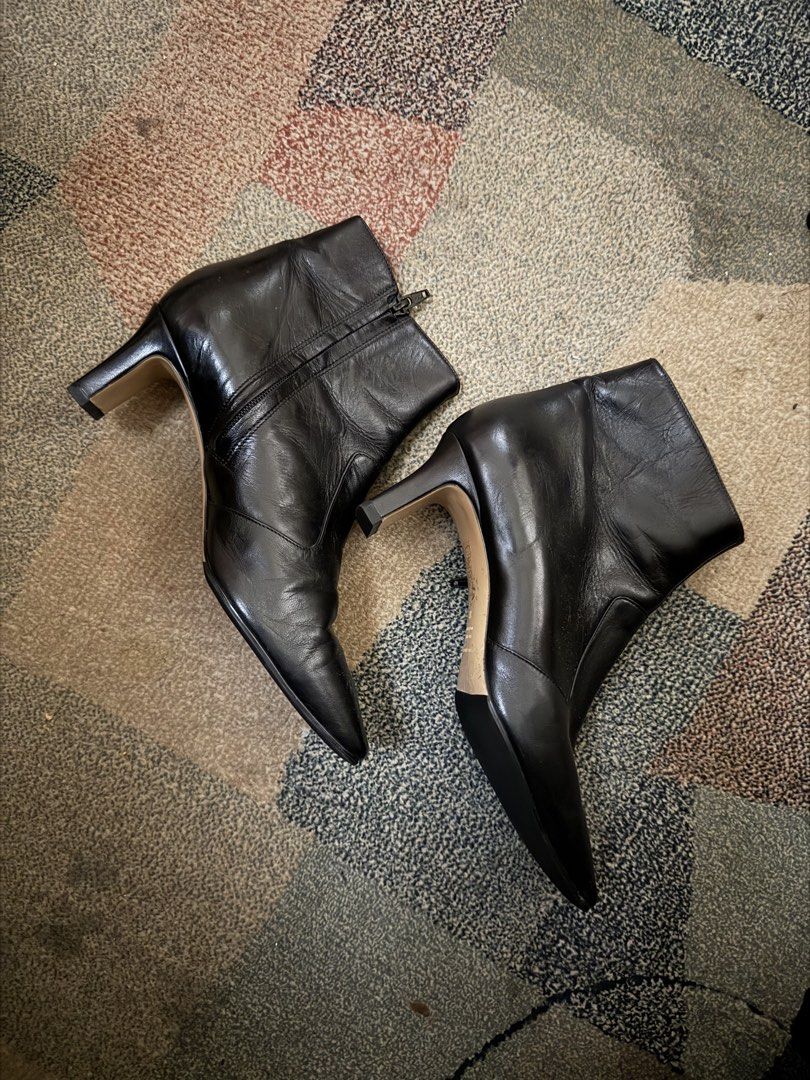 Fabio Rusconi Square Toe Boots (Category: Boots) located in Manila. Submitted by franchescaraind (Listing ID 1468644070, Image 2). Description: - Brand: Fabio Rusconi - Size: 39 (Made in Italy) - Material: Smooth genuine leather upper and leather sole - Design: Square toe, slim kitten heel, and convenient side zip closure - Condition: Minor wear on soles from normal use, overall classic everyday style.