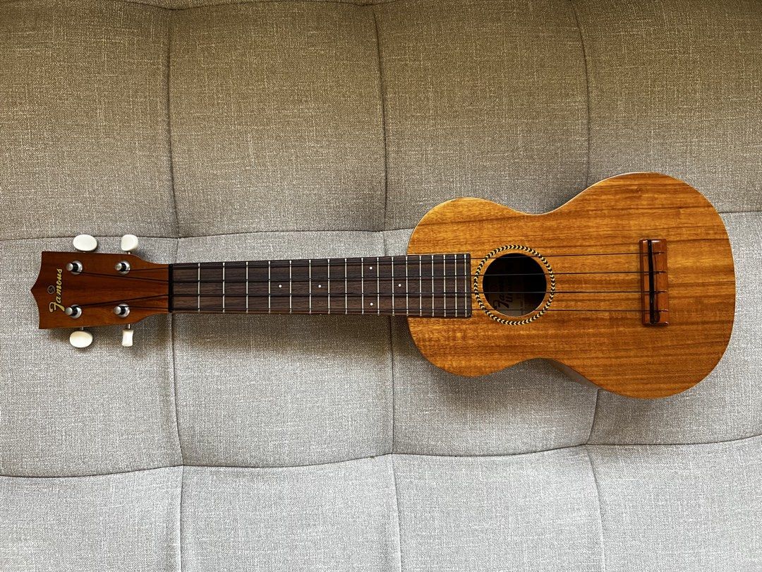 Famous FS-8 Soprano Ukulele (Category: Musical Instruments) located in Dagupan City. Submitted by rick.cas (Listing ID 1468558835, Image 1). Description: Famous FS-8 Soprano Ukulele *with soft padded case - This is an all-laminate ukulele made out of Hawaiin Koa (its finish is a koa veneer) -This uke features geared tuners than the traditional friction tuners for a soprano uke. - Similar to the FS-5, the FS-8 produces a very bright sound comparab